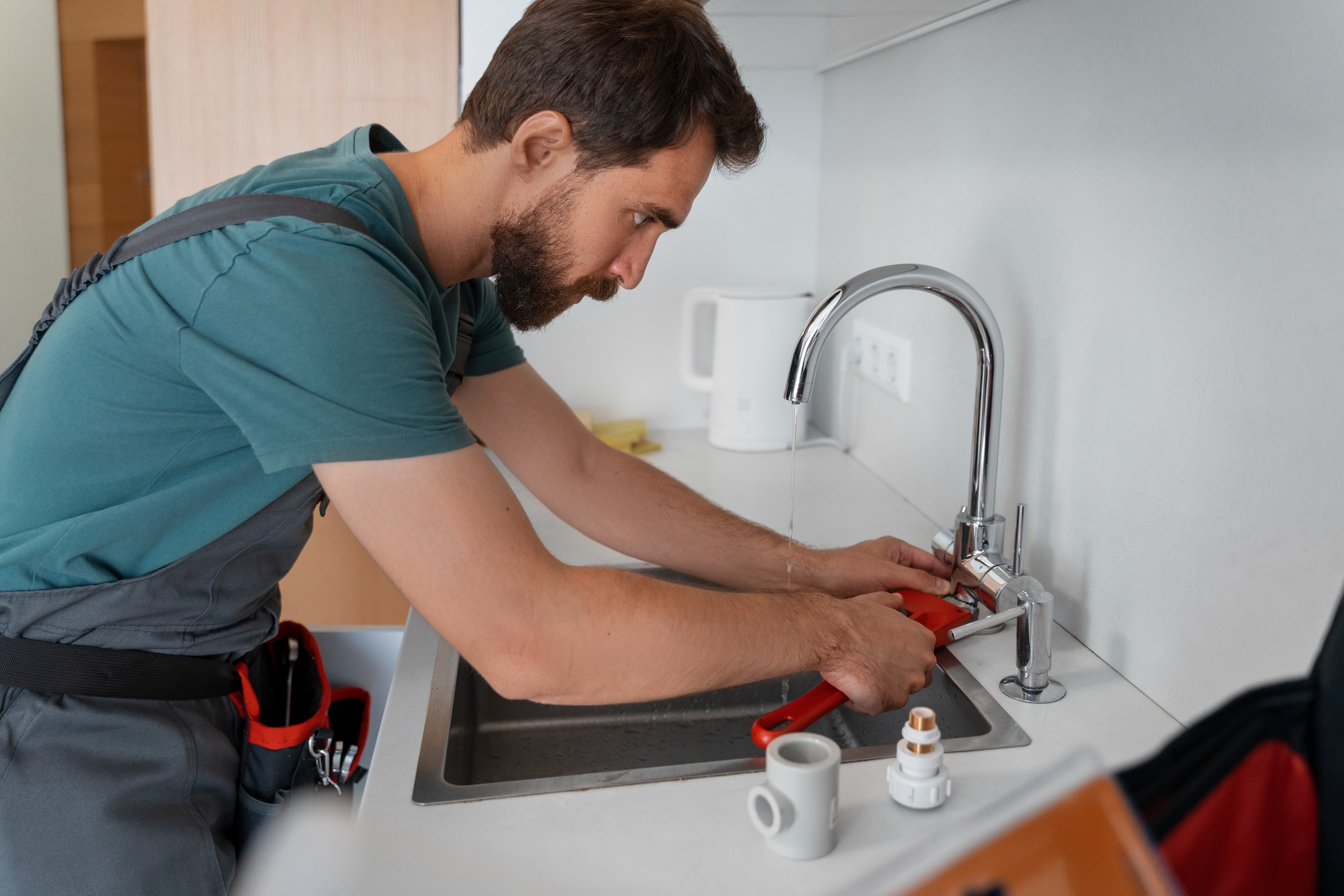 plumber fixing basin